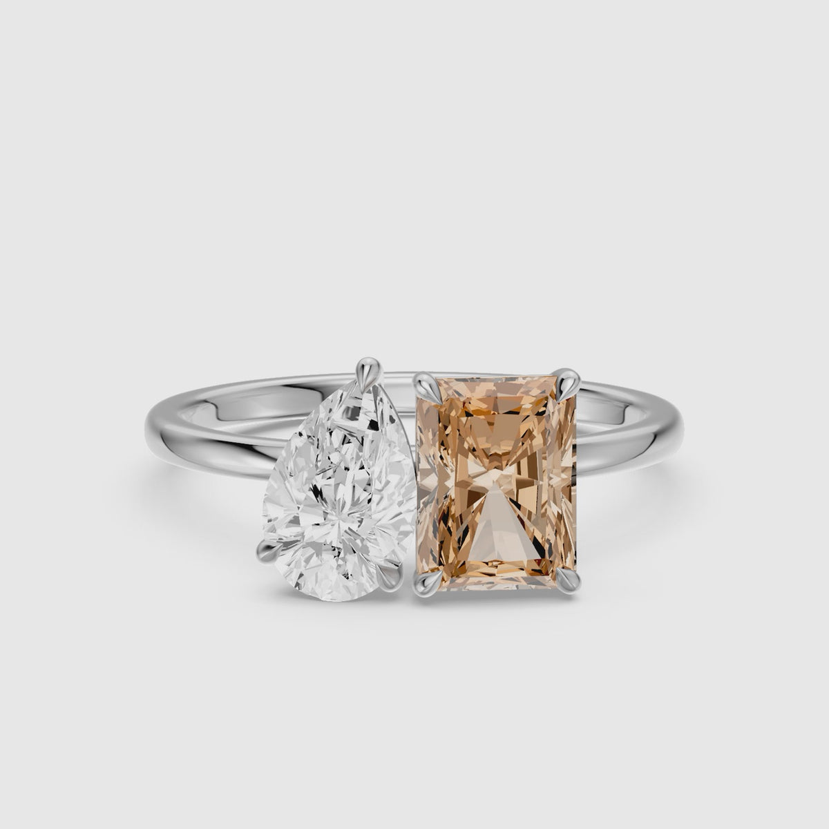 Load video: Cintia Champagne Radiant and Pear Cut Colored Lab Grown Diamond Toi et Moi Ring