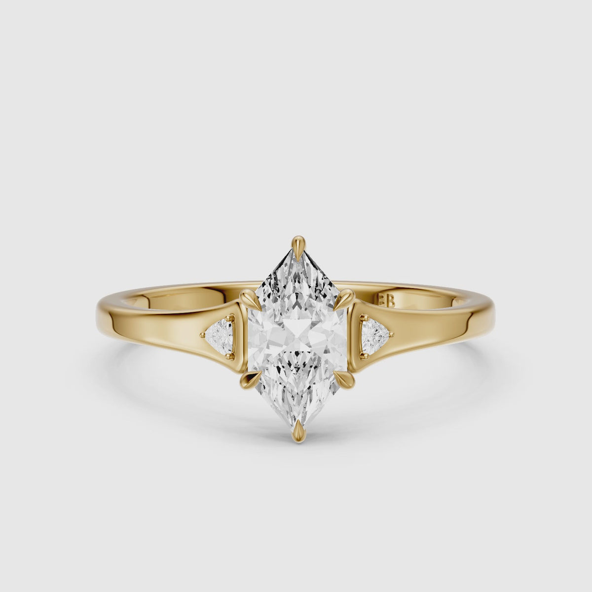 Load video: Zelia Dutch Marquise Moissanite Diamond Ring with Trillion Side Stones