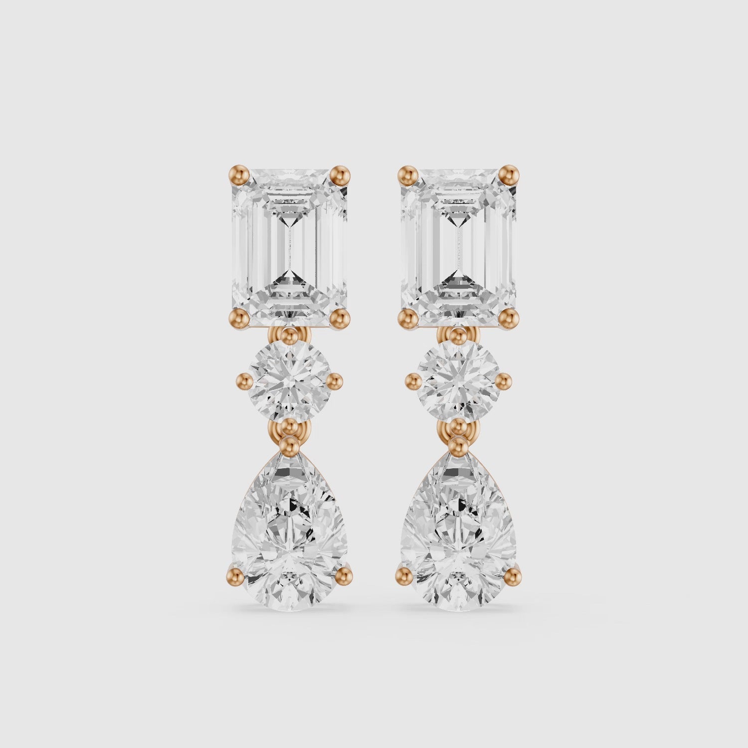 Load video: Gracelyn Emerald, Round and Pear Cut Lab Grown Diamond Dangle Earrings