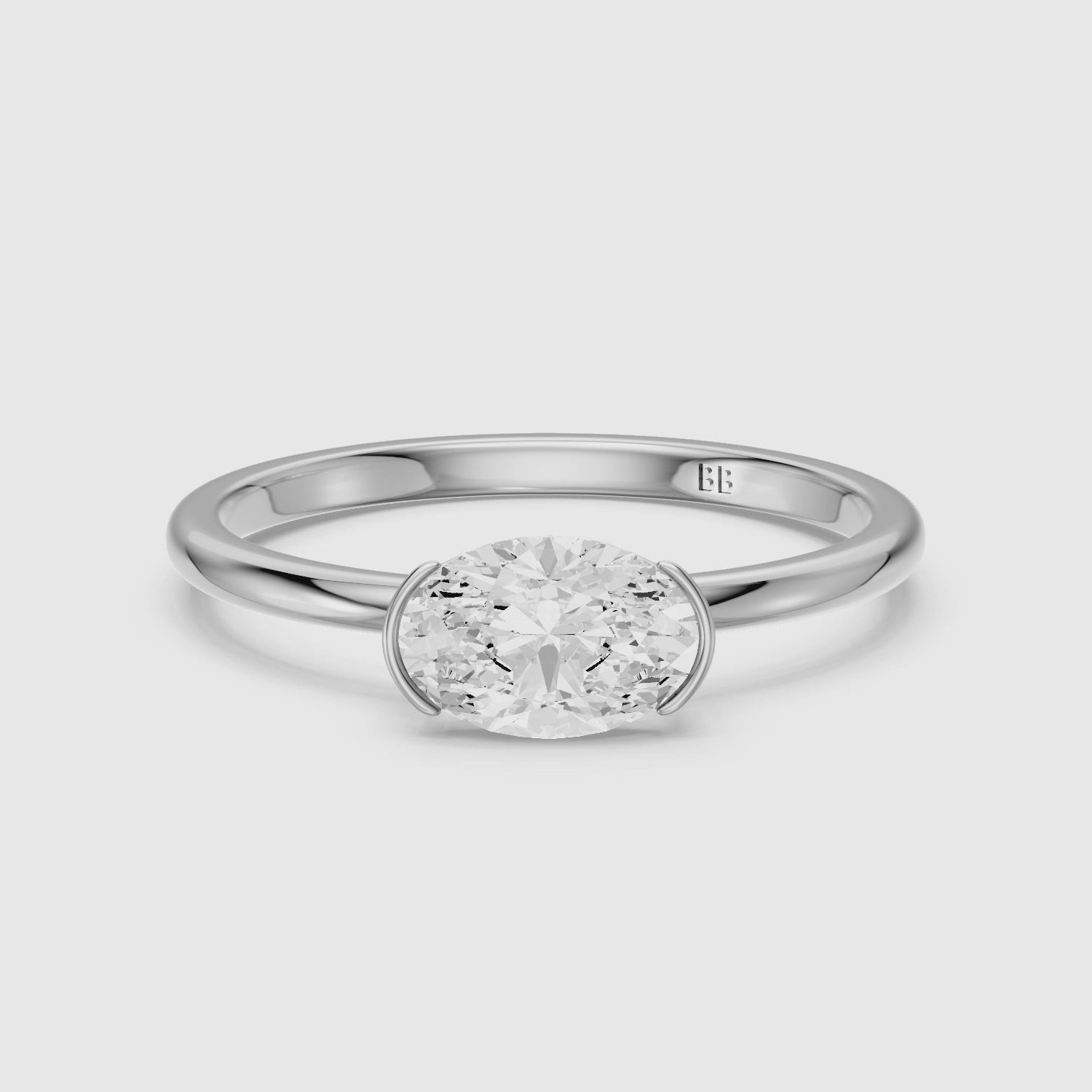 Load video: Zendaya Oval Cut East West Half Bezel Lab Grown Diamond Ring