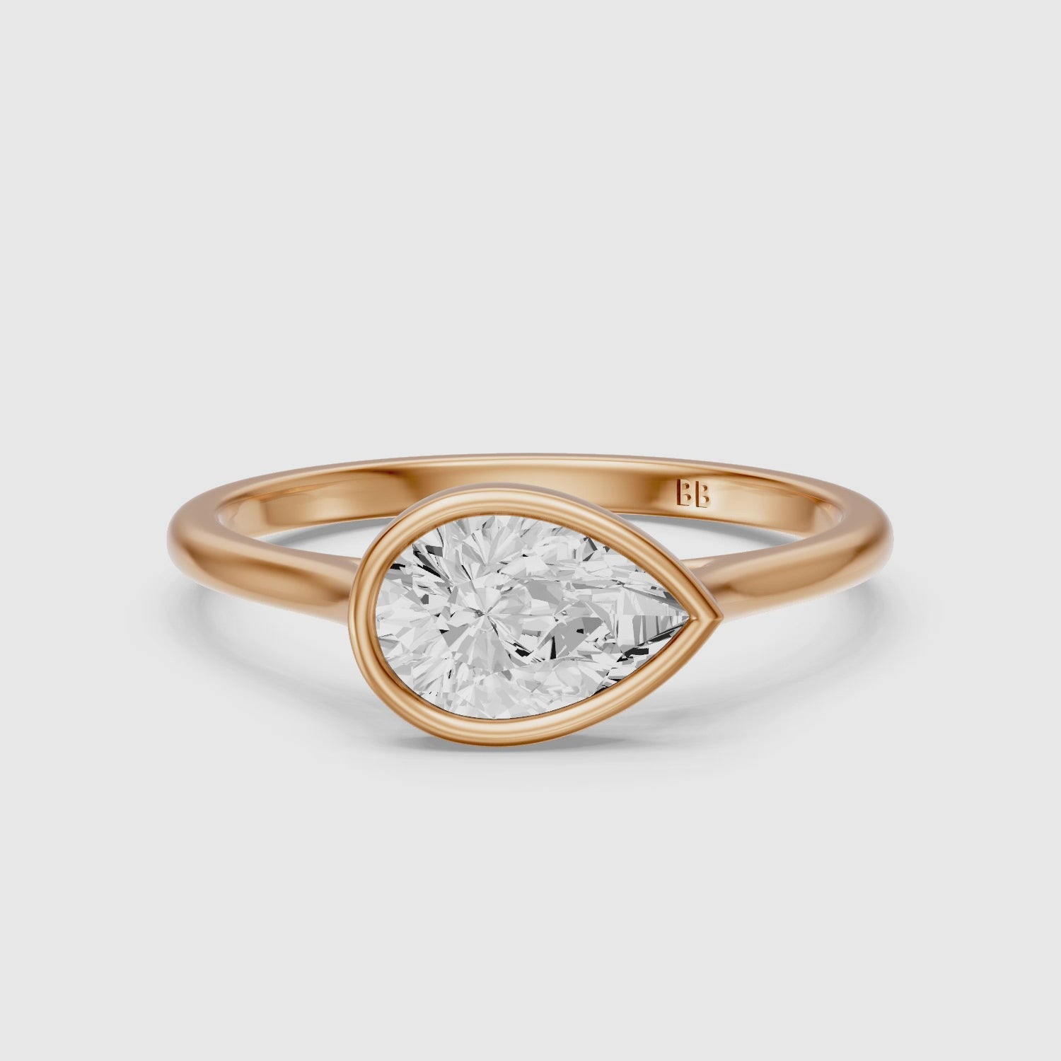 Load video: Madison Pear Cut East West Bezel Lab Grown Diamond Engagement Ring