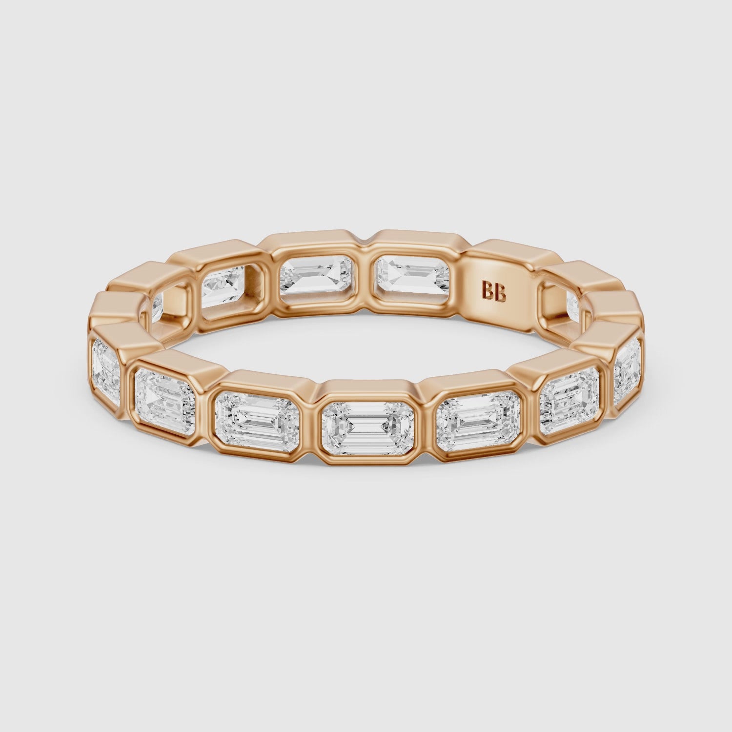 Load video: Billie Emerald Cut Bezel Set Lab Grown Diamond Eternity Wedding Band