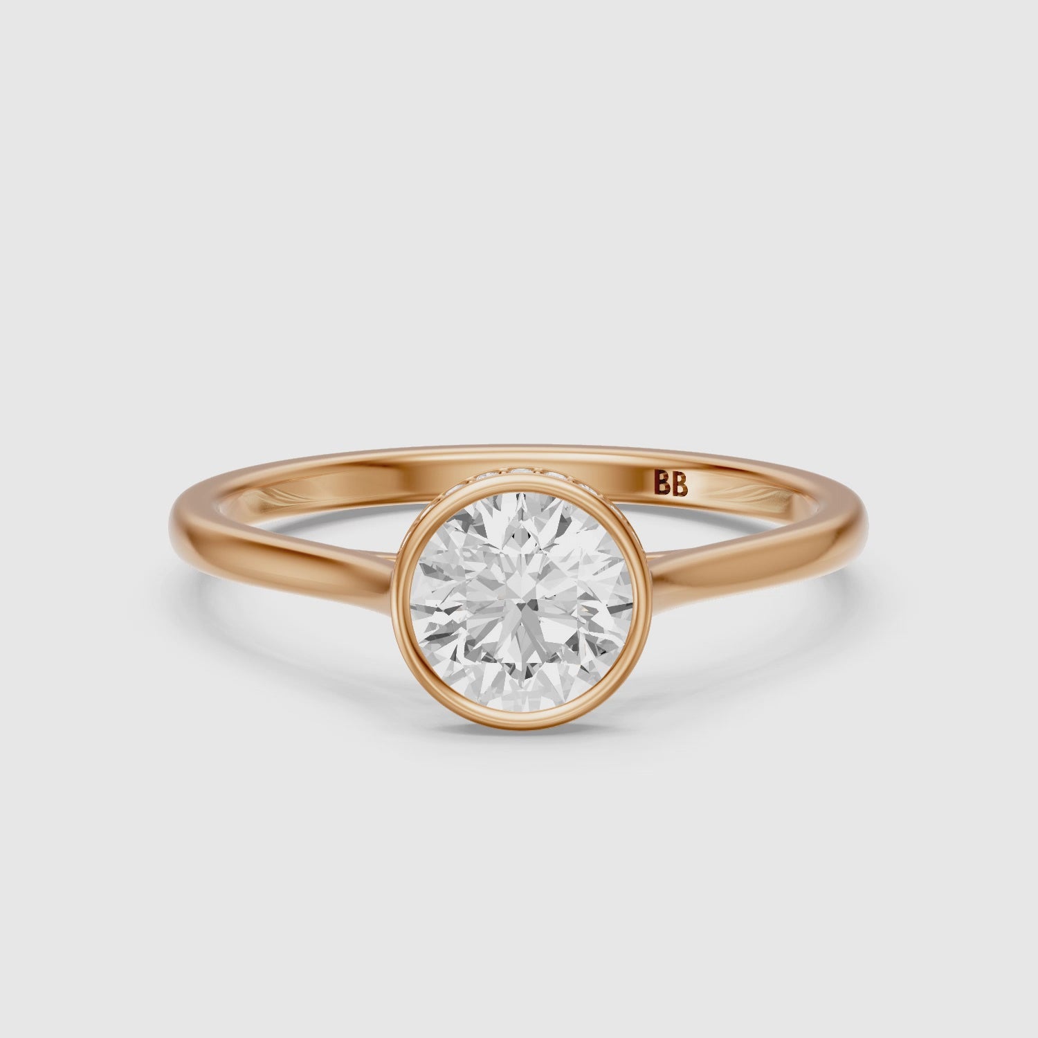Load video: Kamryn Round Cut Bezel Set Hidden Halo Lab Grown Diamond Ring