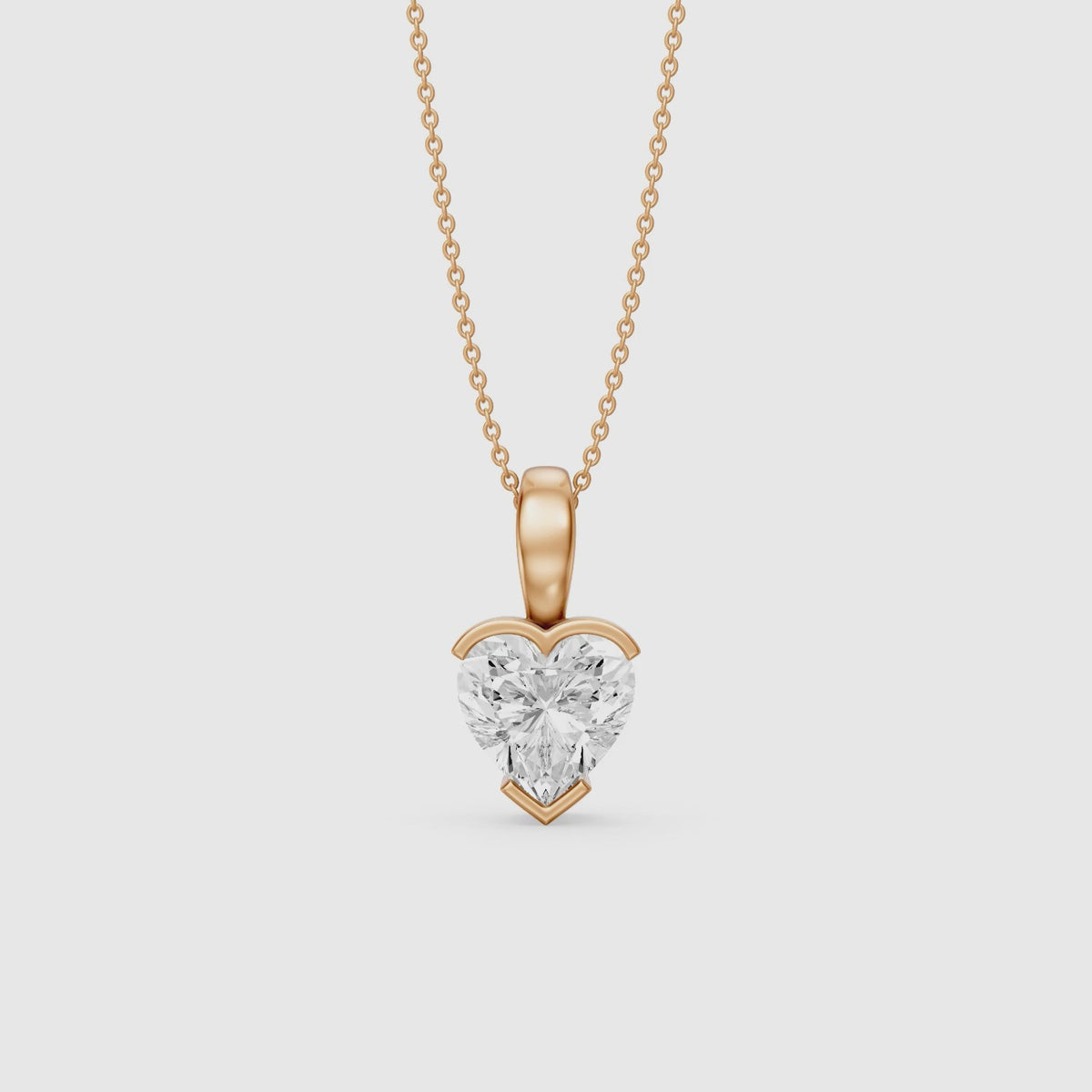 Load video: Jordyn Heart Shape Lab Grown Diamond Half Bezel Pendant