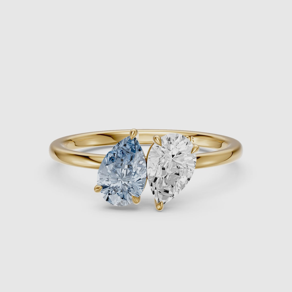 Load video: Axelle Blue and White Both Pear Cut Color Lab Grown Diamond Toi et Moi Ring