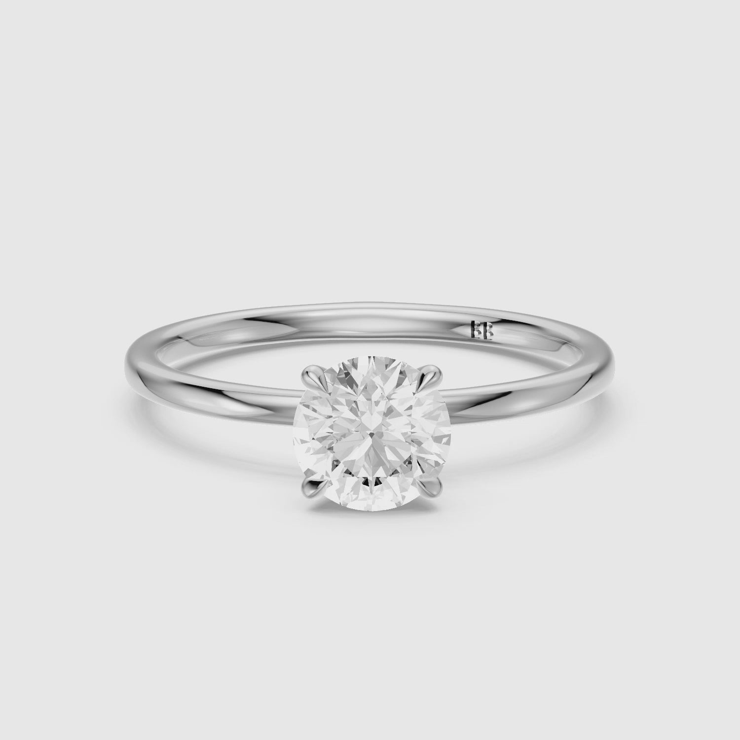 Load video: Jennah 4 Prong Round Cut Solitaire Moissanite Diamond Ring