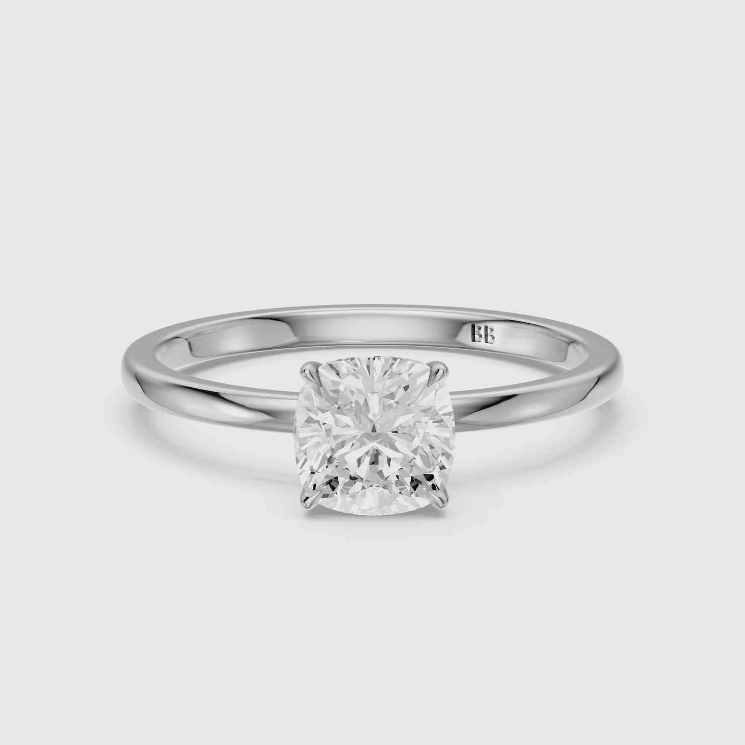 Load video: Skylyn Cushion Cut Low Profile Solitaire Lab Grown Diamond Ring