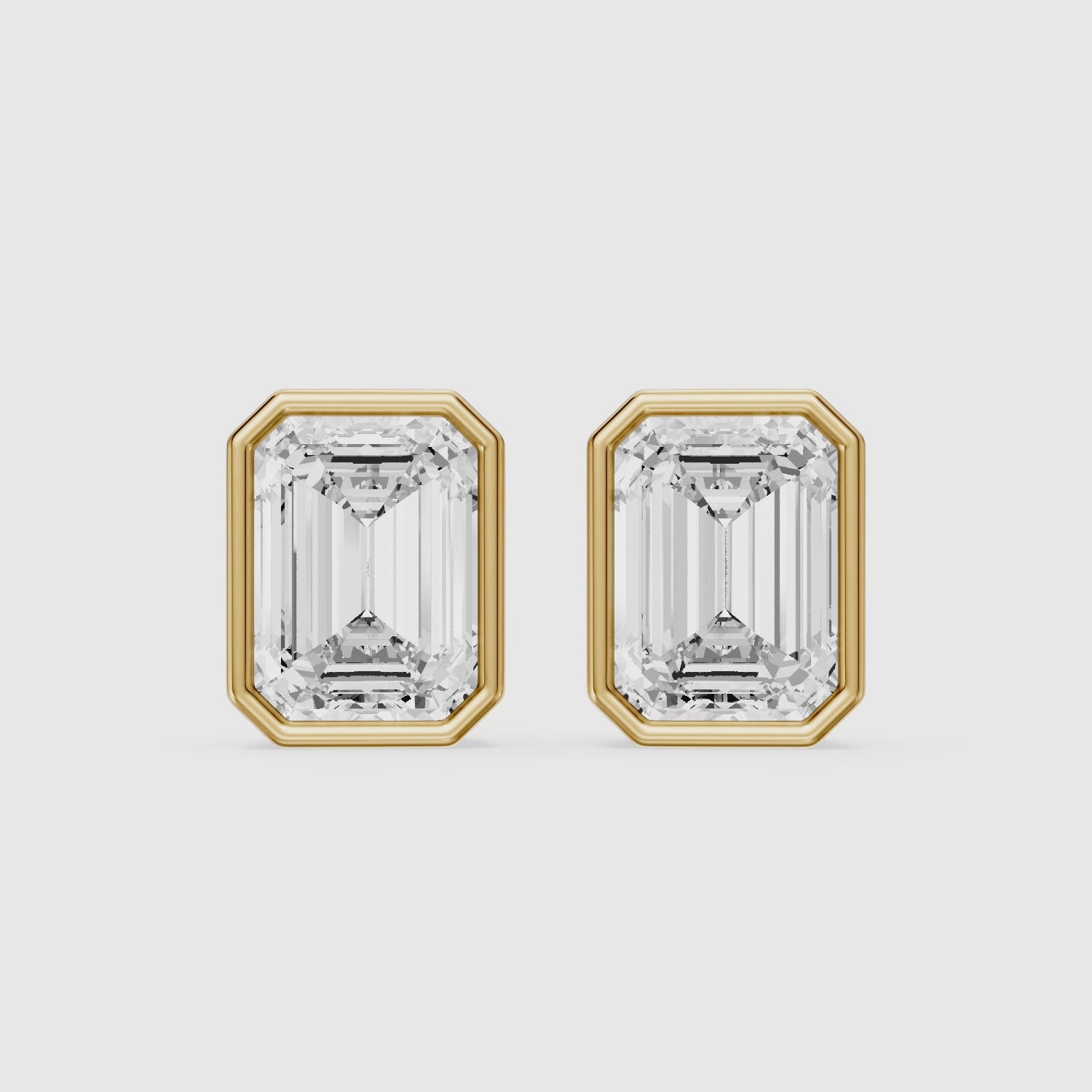 Load video: Miriam Emerald Cut Lab Grown Diamond Bezel Set Stud Earrings