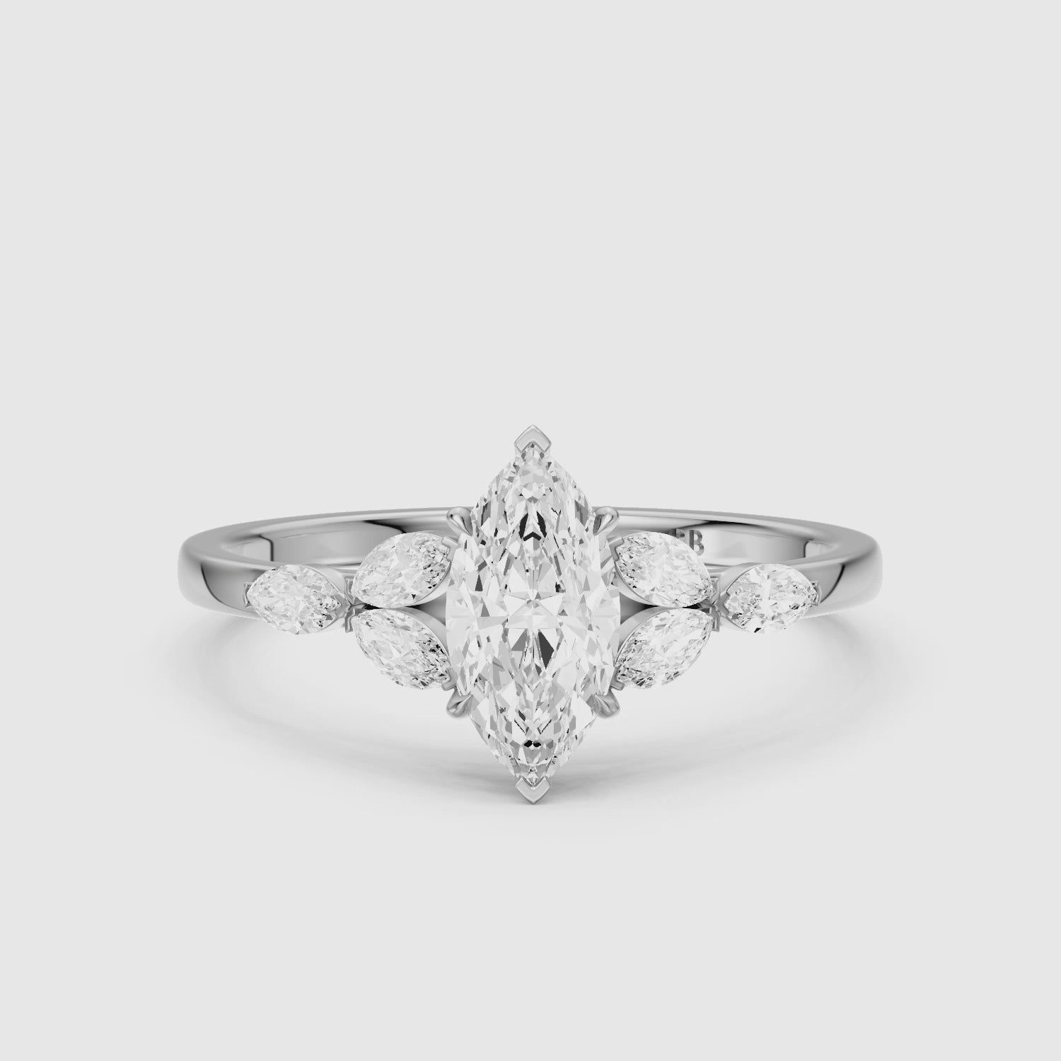 Load video: Wrenley Marquise Cut Lab Grown Diamond Ring with Marquise Side Stones