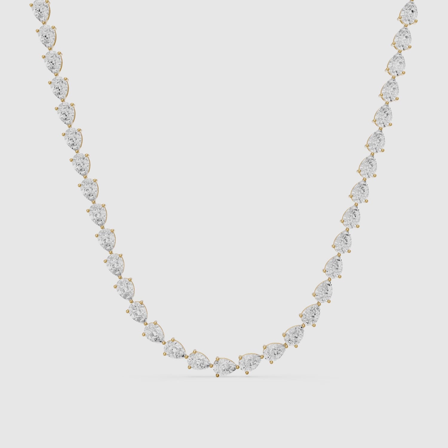 Load video: Beatrice Pear Lab Grown Diamond Three-Prong Tennis Necklace