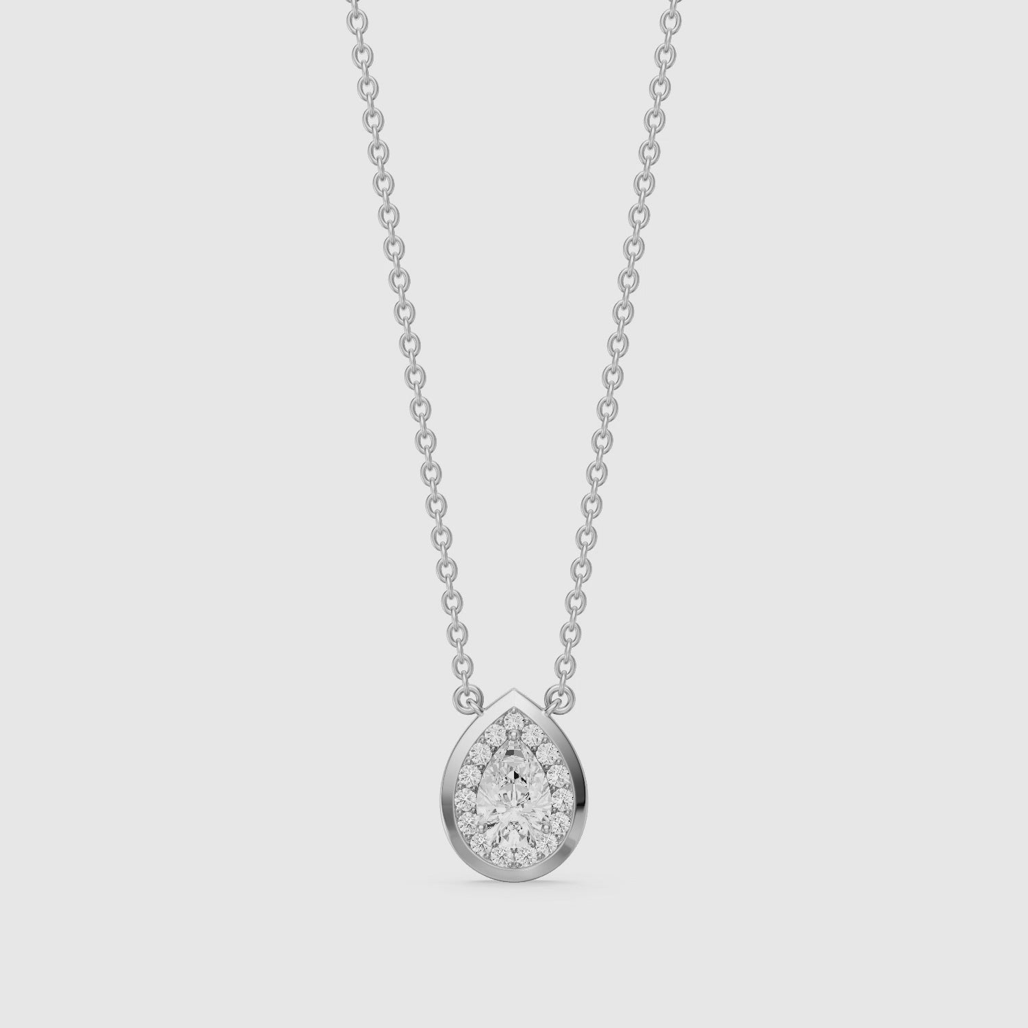 Load video: Lydia Pear Shape Lab Grown Diamond Halo Pendant