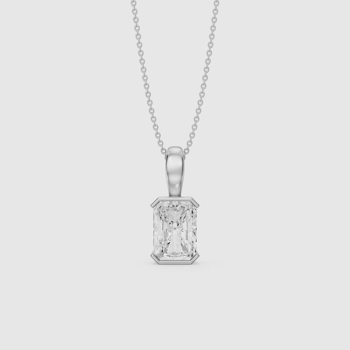 Load video: Helena Half Bezel Radiant Cut Lab Diamond Pendant