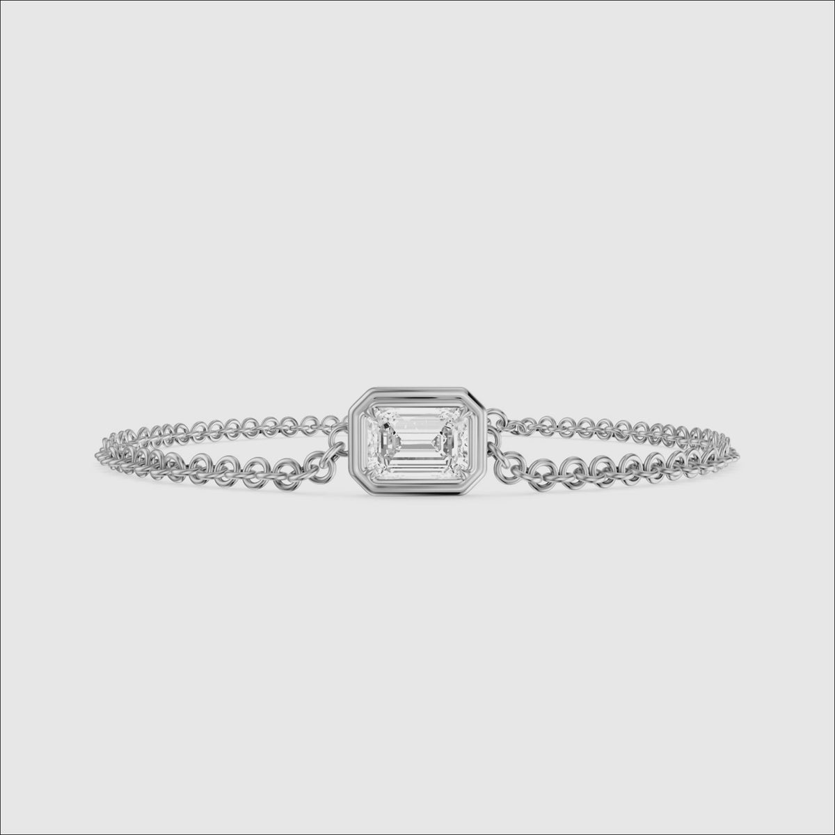 Load video: Keely East West Emerald Cut Lab Grown Diamond Single Stone Bezel Bracelet