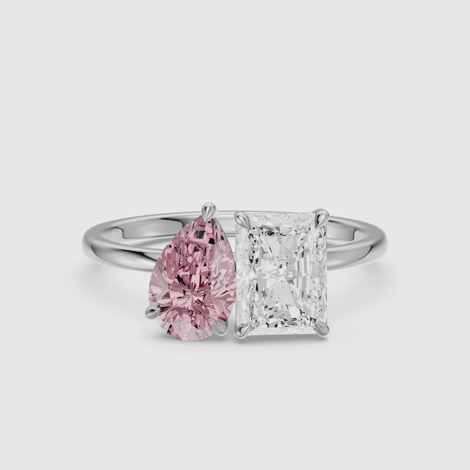 Load video: Zita Pink Pear and Radiant Cut Colored Lab Grown Diamond Toi et Moi Ring
