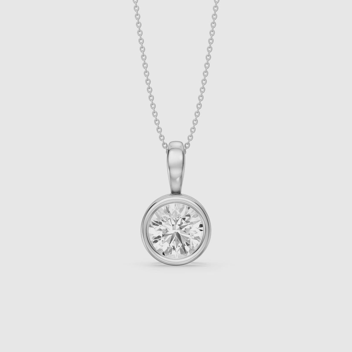 Load video: Shiri Round Lab Grown Diamond Bezel Solitaire Pendant