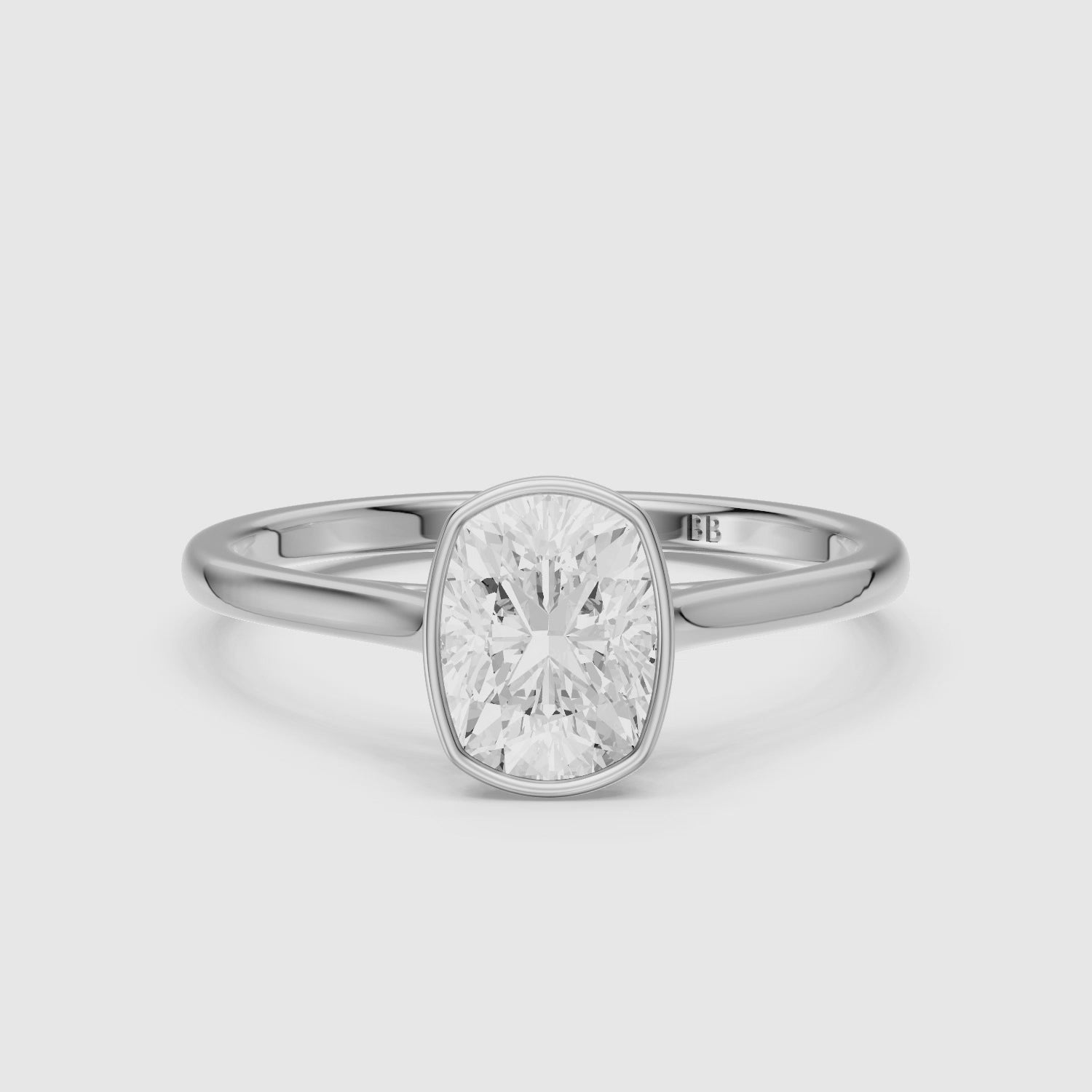 Load video: Marlyn Elongated Cushion Cut Bezel Set Moissanite Diamond Ring