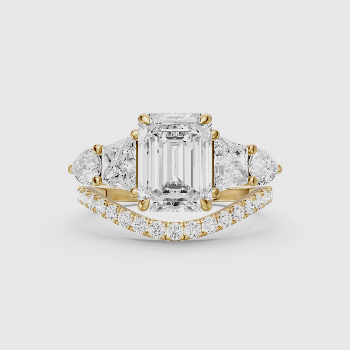 Load video: Nyla Five Stone Emerald Cut Lab Grown Diamond Bridal Set with Curved Pave Band