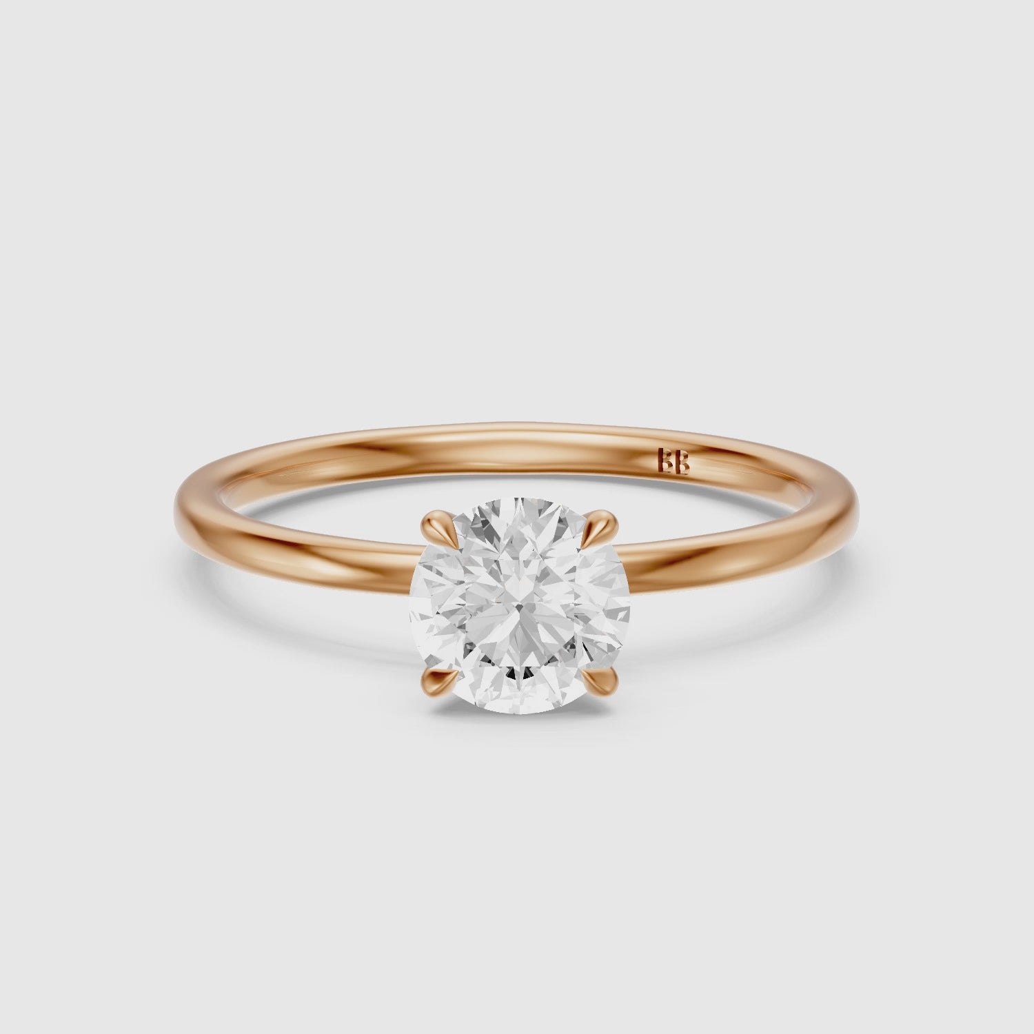 Load video: Jennah 4 Prong Round Cut Solitaire Moissanite Diamond Ring