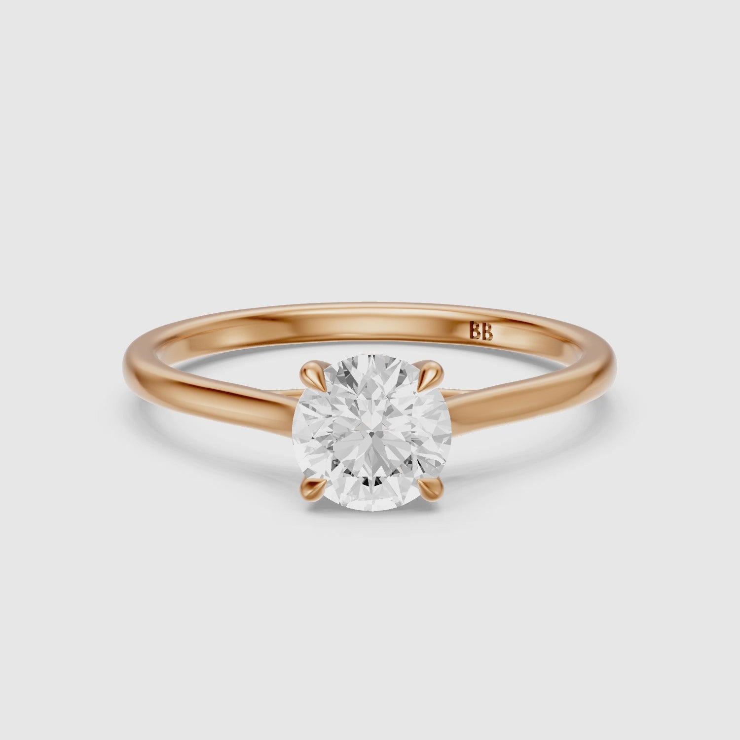 Load video: Reagan 4 Prong Round Cut Solitaire Lab Grown Diamond Ring