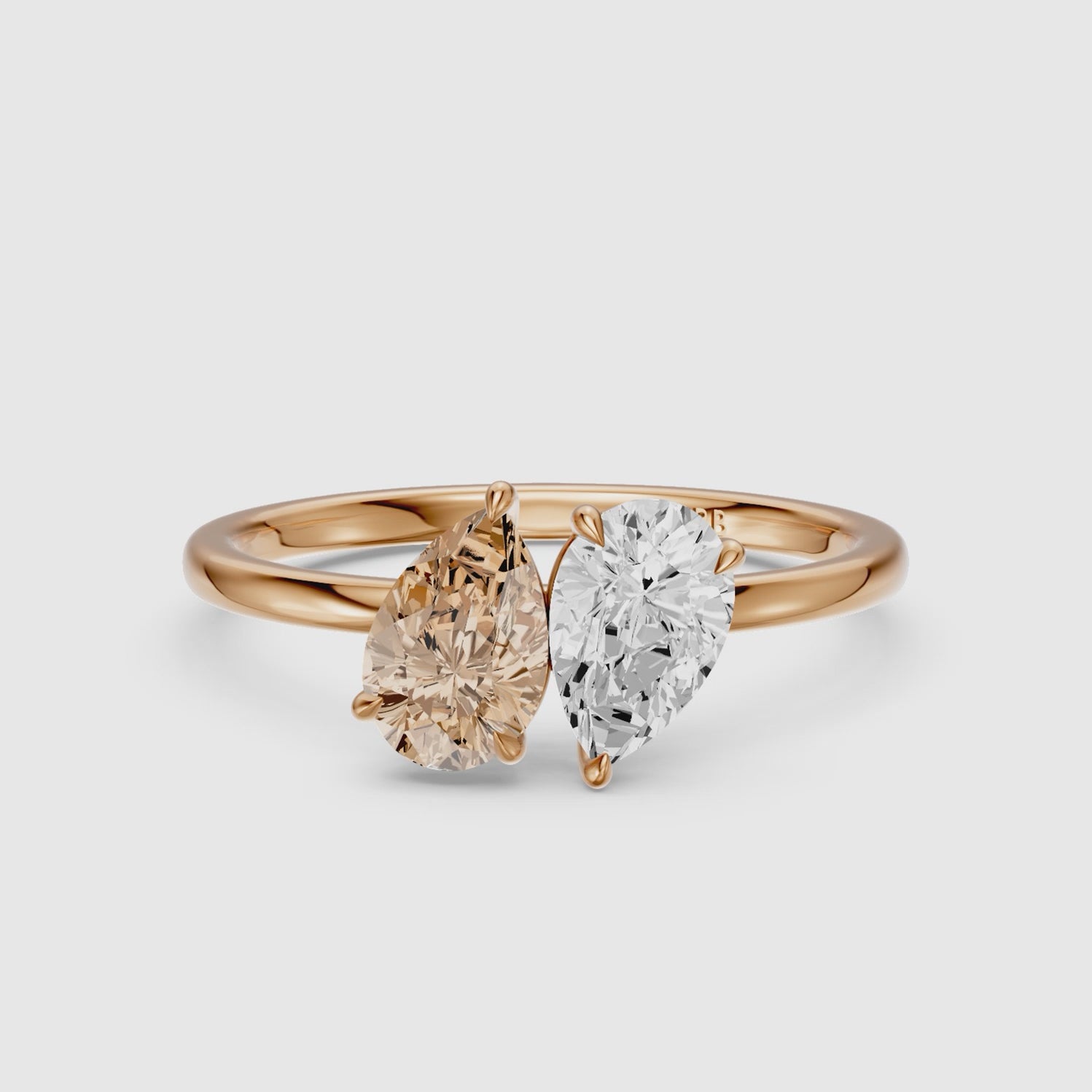 Load video: Alba Champagne and White Both Pear Cut Color Lab Grown Diamond Toi et Moi Ring