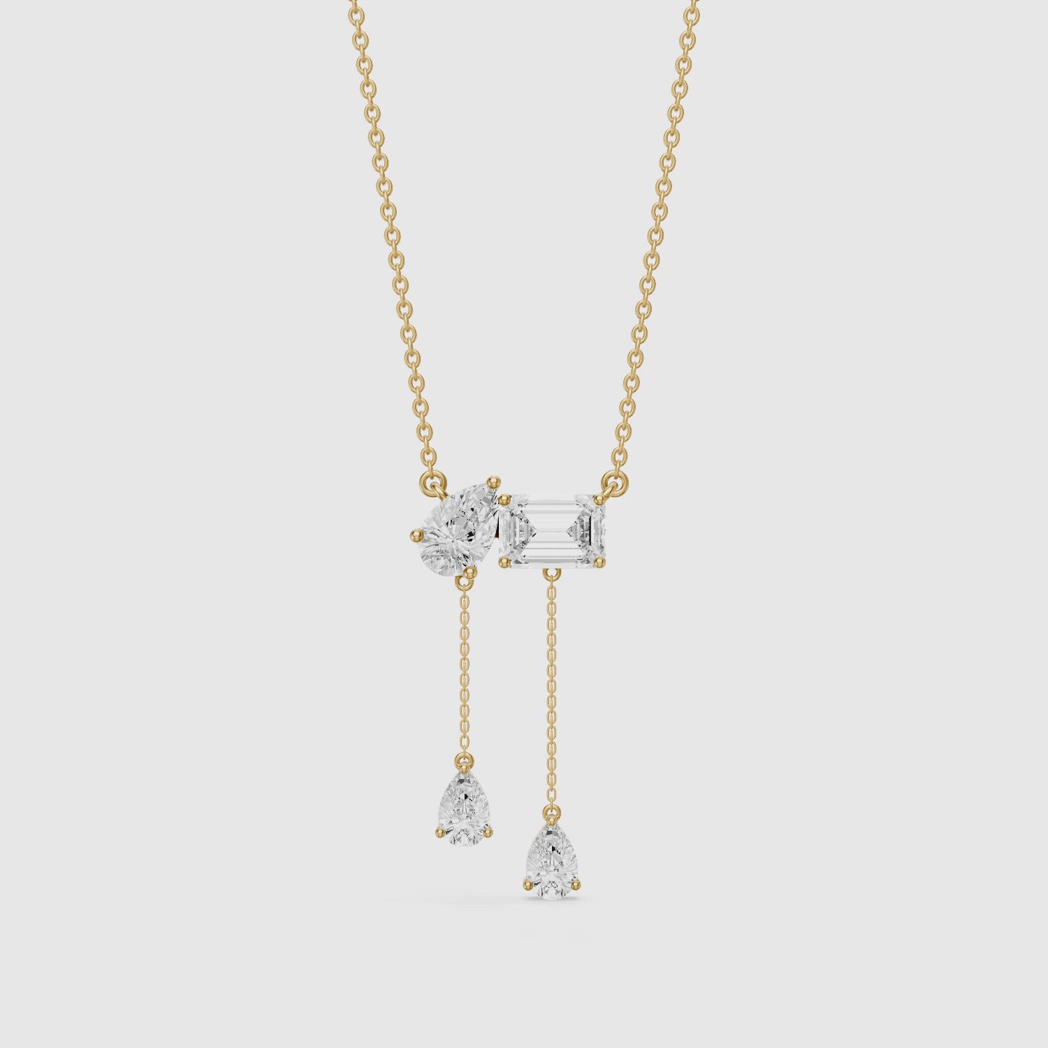 Load video: Flora Pear and Emerald Cut Lab Grown Diamond Tassel Necklace
