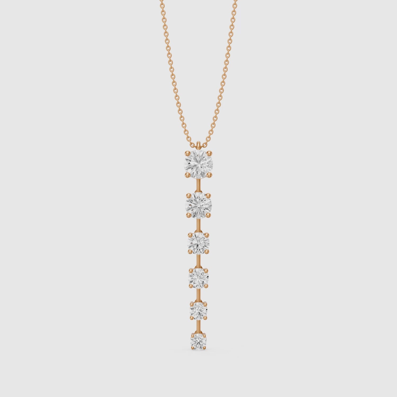 Load video: Delia Graduated Round Lab Grown Diamond Drop Pendant