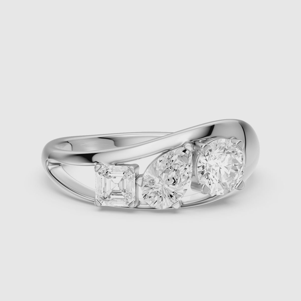 Load video: Zena Round Three Stone Bypass Lab Grown Diamond Engagement Ring