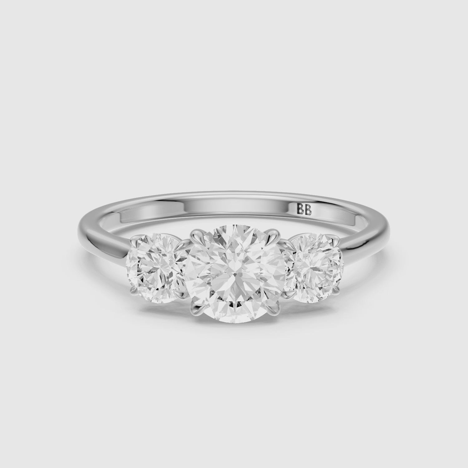 Load video: Kenlee Three Stone Round Cut Cathedral Lab Grown Diamond Ring