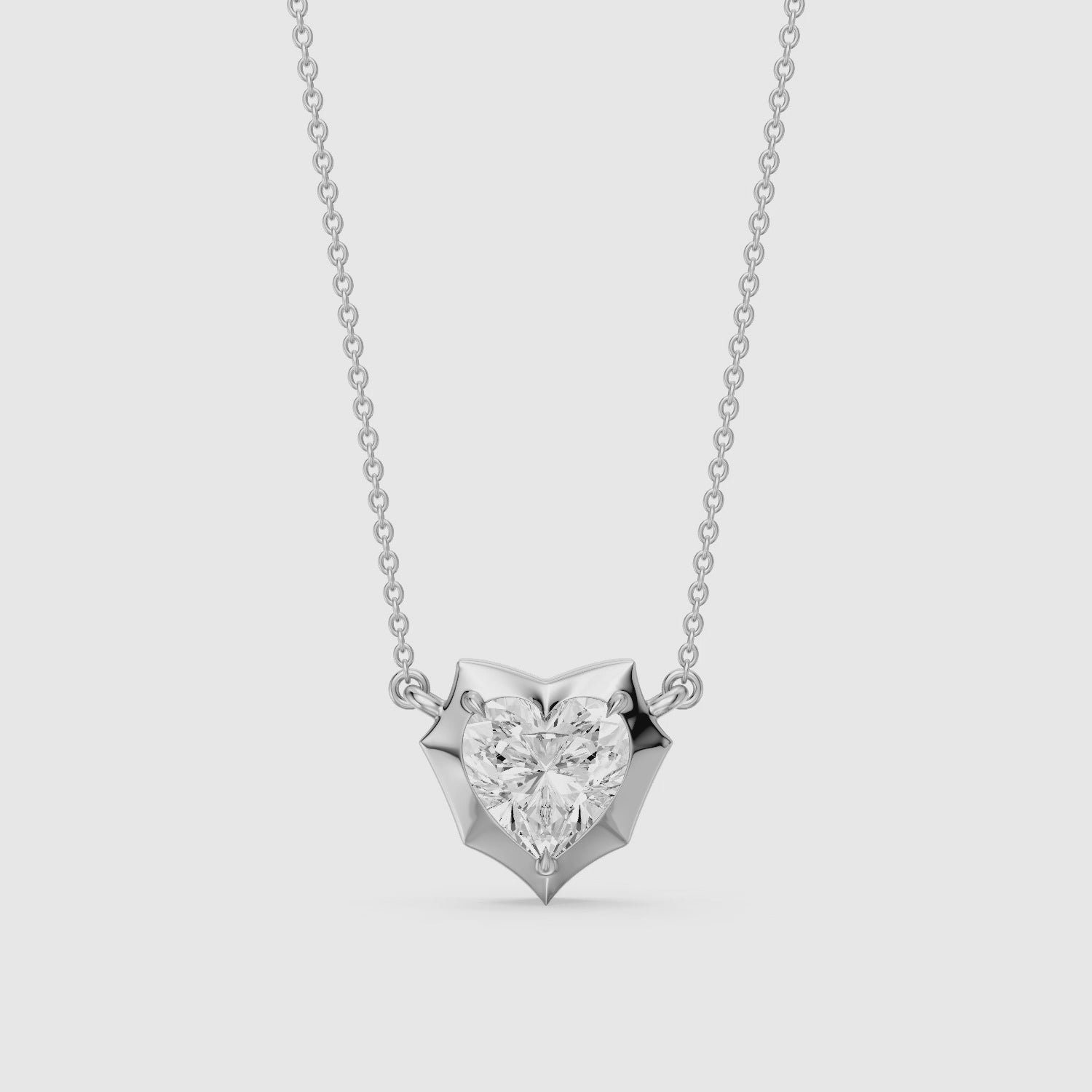 Load video: Jana Heart Shape Lab Grown Diamond Abstract Bezel Pendant