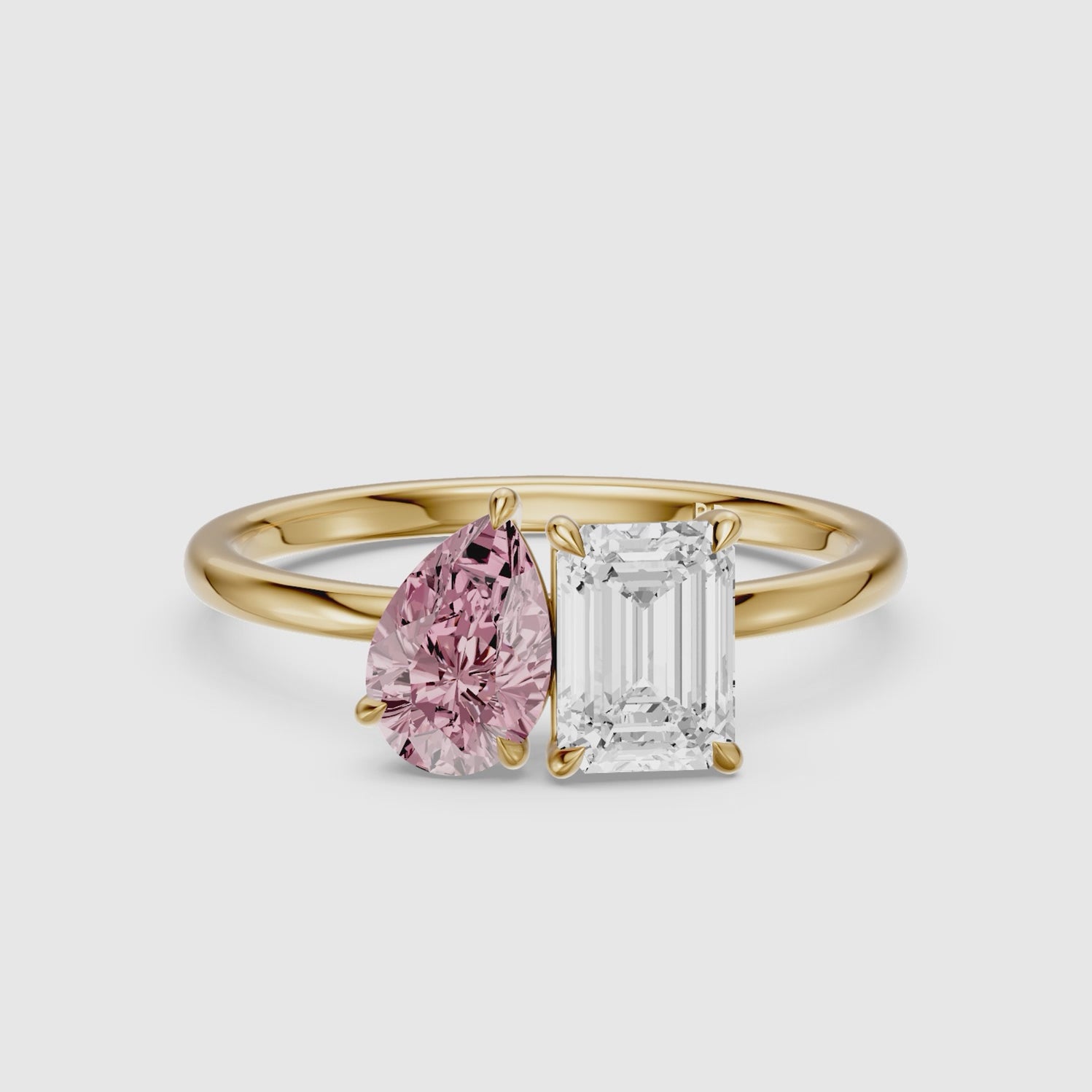 Load video: Milena Pink Pear and Emerald Cut Color Lab Grown Diamond Toi et Moi Ring