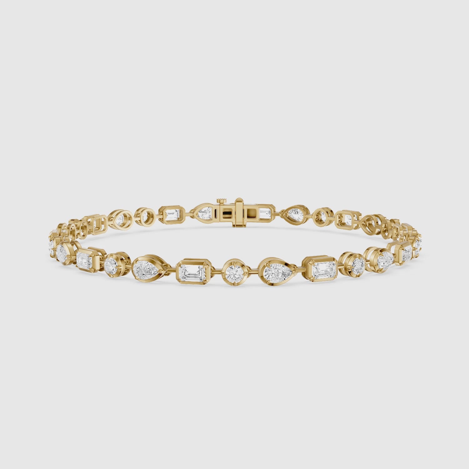 Load video: Ezra Pear, Emerald Cut and Round Lab Grown Diamond Tennis Bracelet