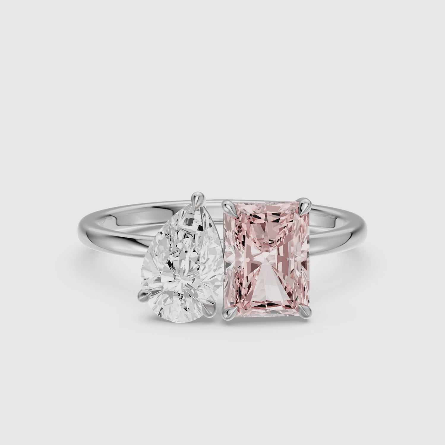 Load video: Liis Pink Radiant and Pear Cut Colored Lab Grown Diamond Toi et Moi Ring