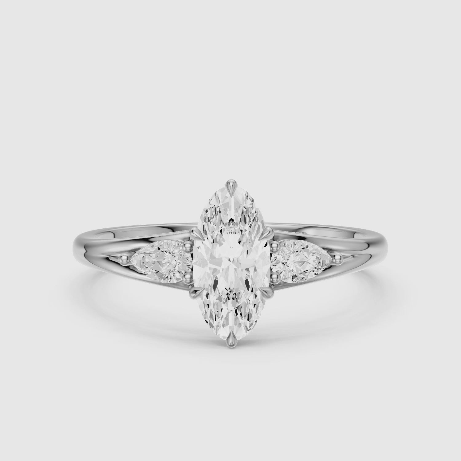 Load video: Connie Moval Lab Grown Diamond Three Stone Ring with Pear Side Stones