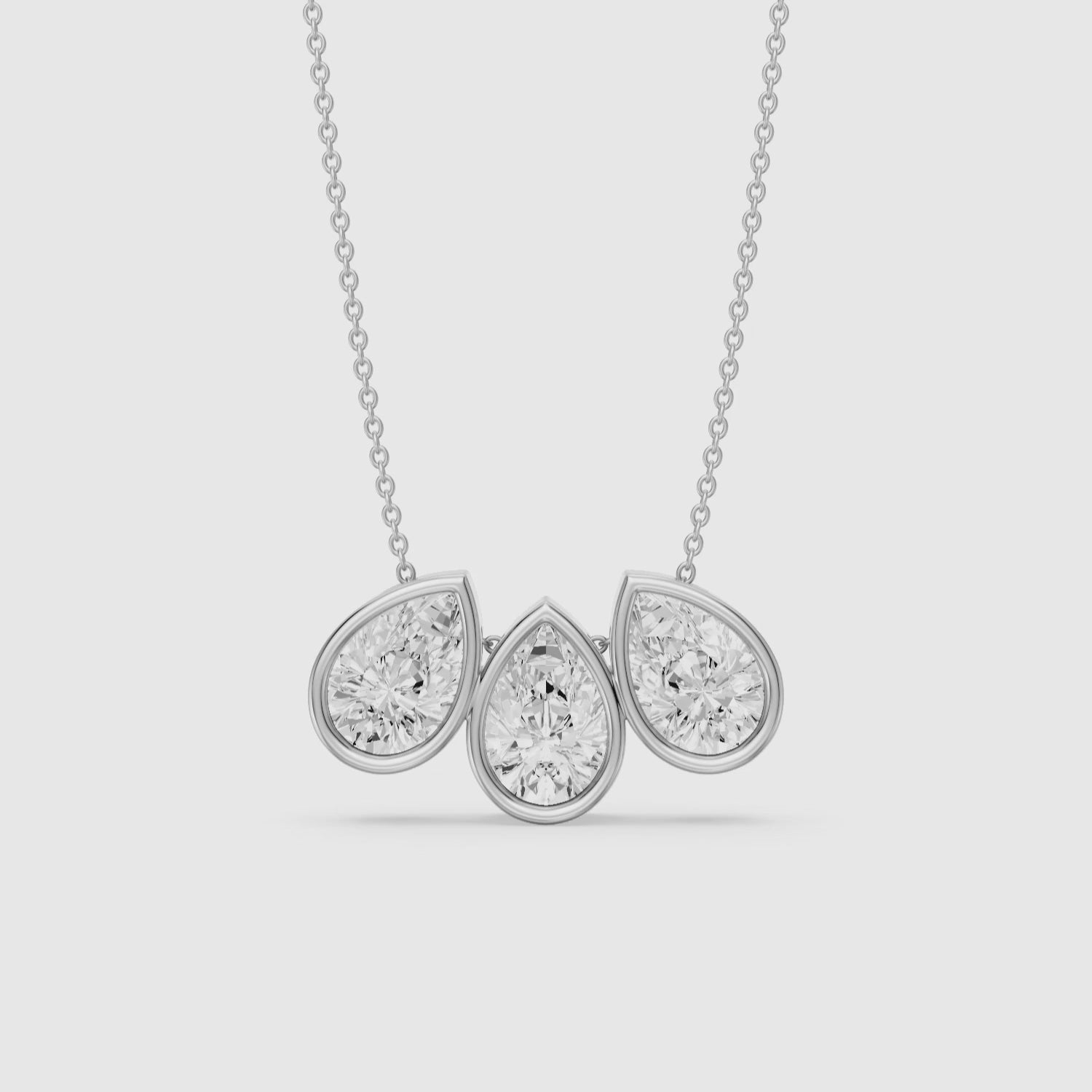 Load video: Hattie Three Stone Pear Lab Grown Diamond Bezel Necklace