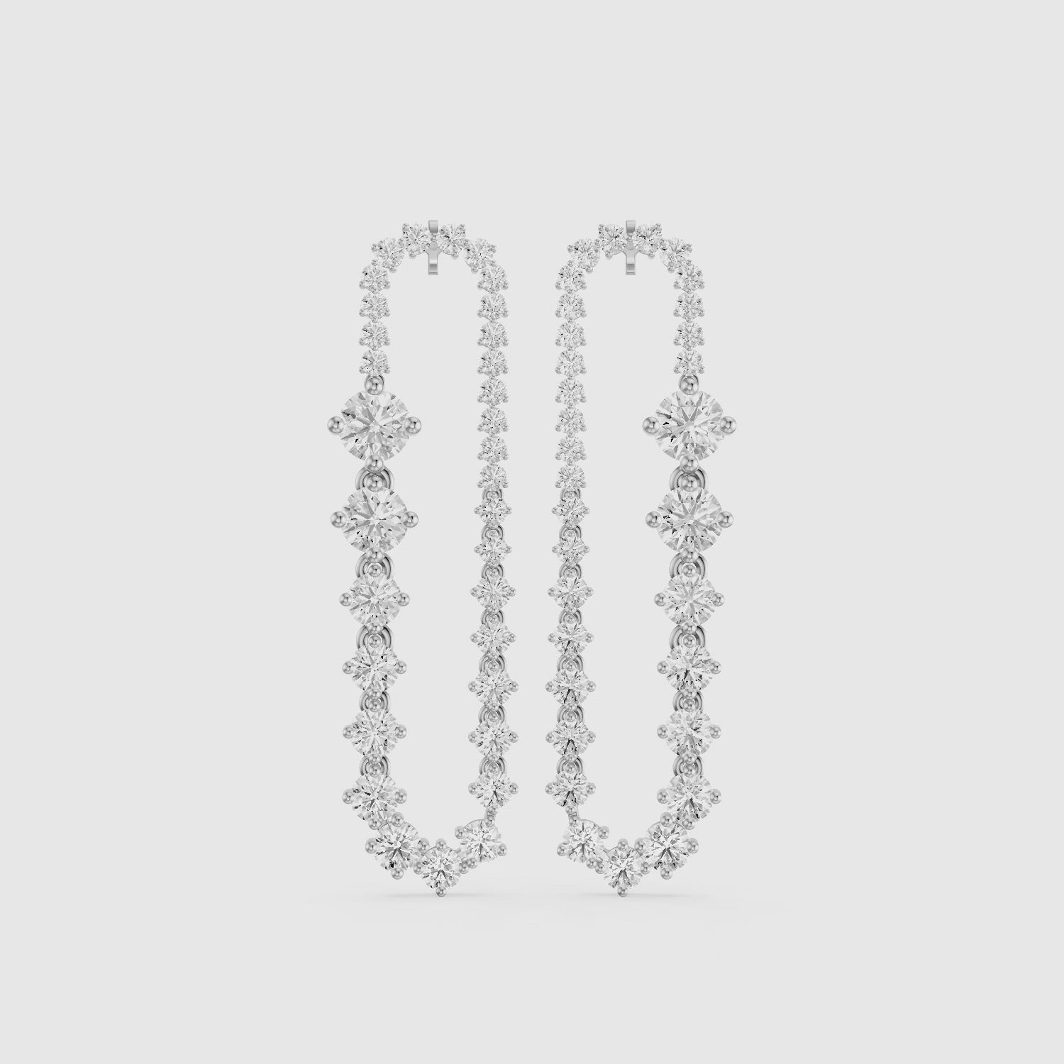 Load video: Reina Graduated Round Lab Grown Diamond Open Loop Drop Earrings