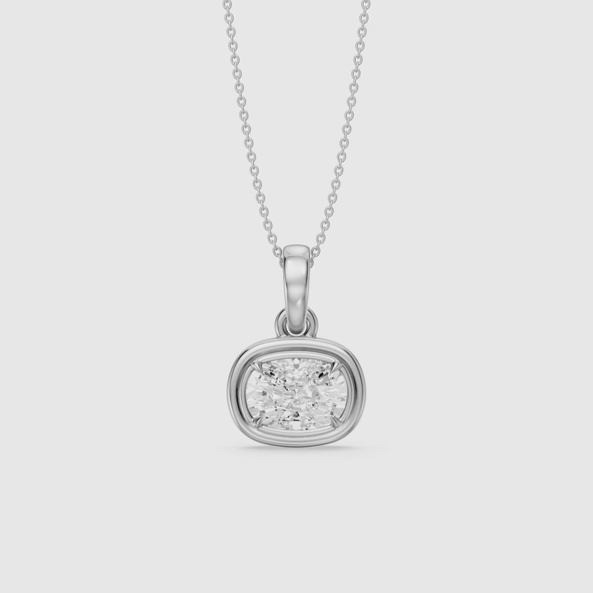 Load video: Carmen East West Elongated Cushion Cut Lab Grown Diamond Bezel Pendant