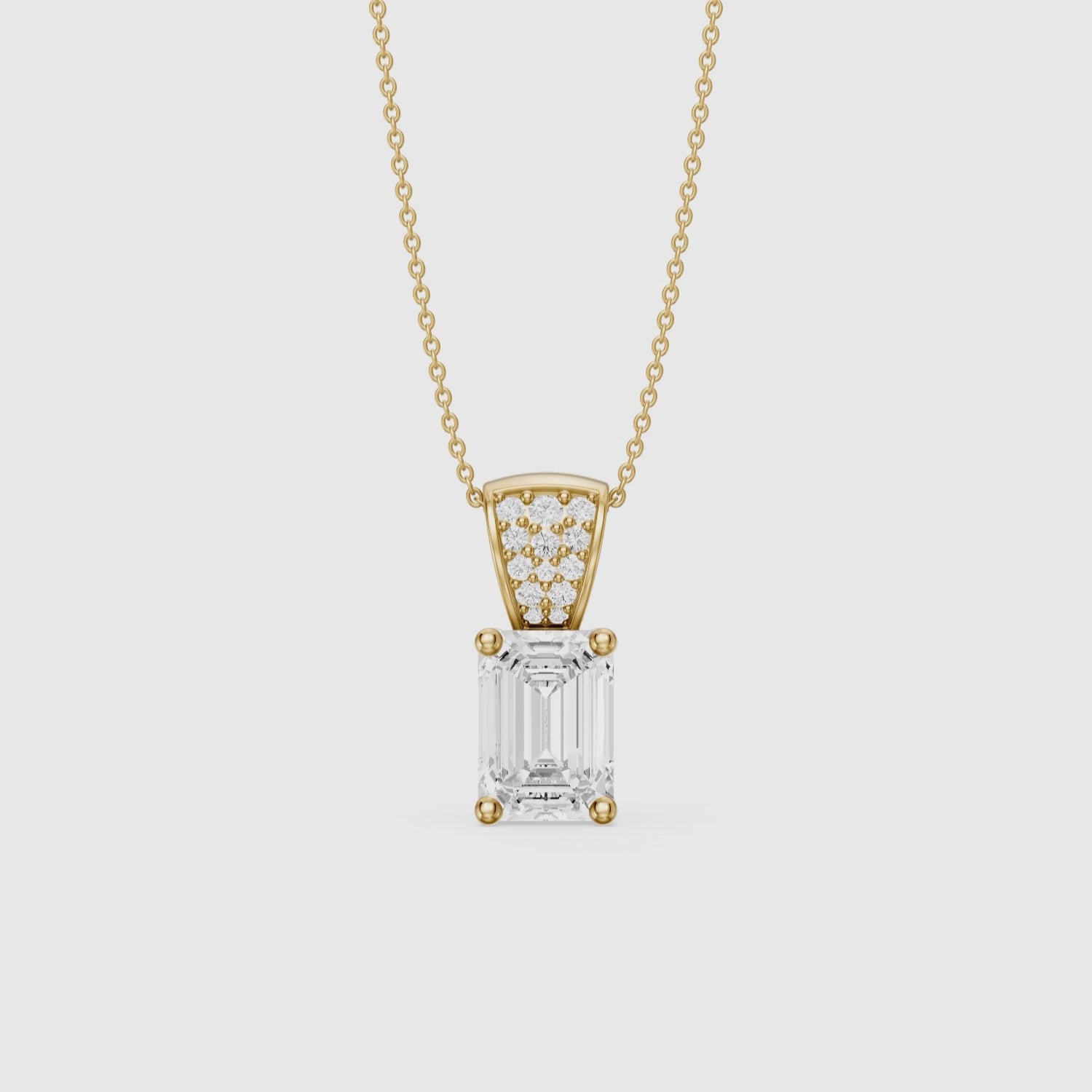 Load video: Adelyn Emerald Cut Lab Grown Diamond Pendant with Pave Bail