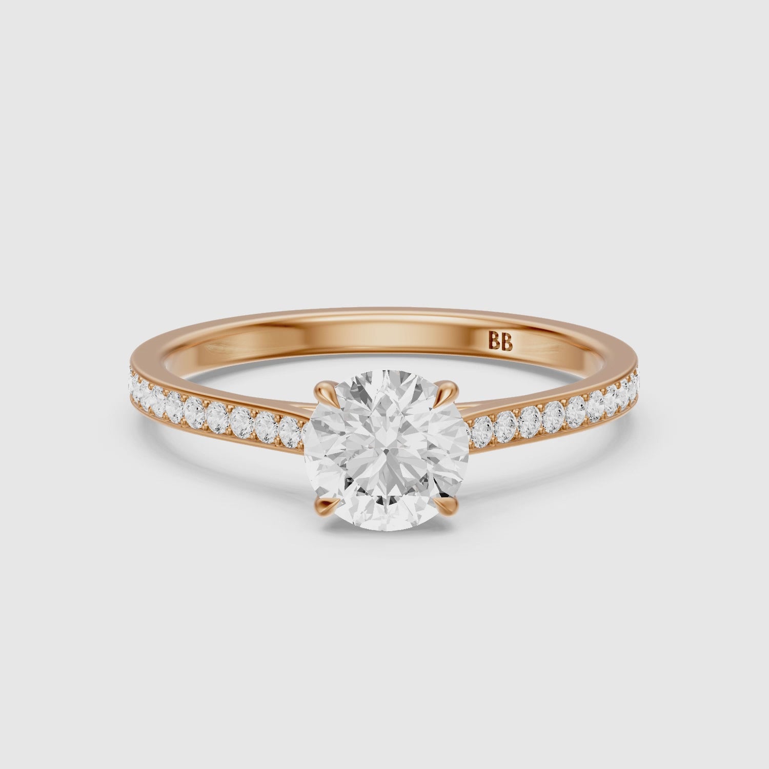 Load video: Jolene 4 Prong Round Cut Side Stone Channel Set Lab Grown Diamond Ring