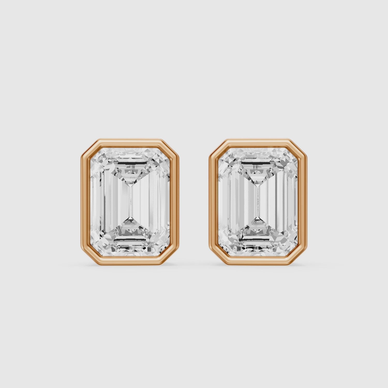 Load video: Miriam Emerald Cut Lab Grown Diamond Bezel Set Stud Earrings