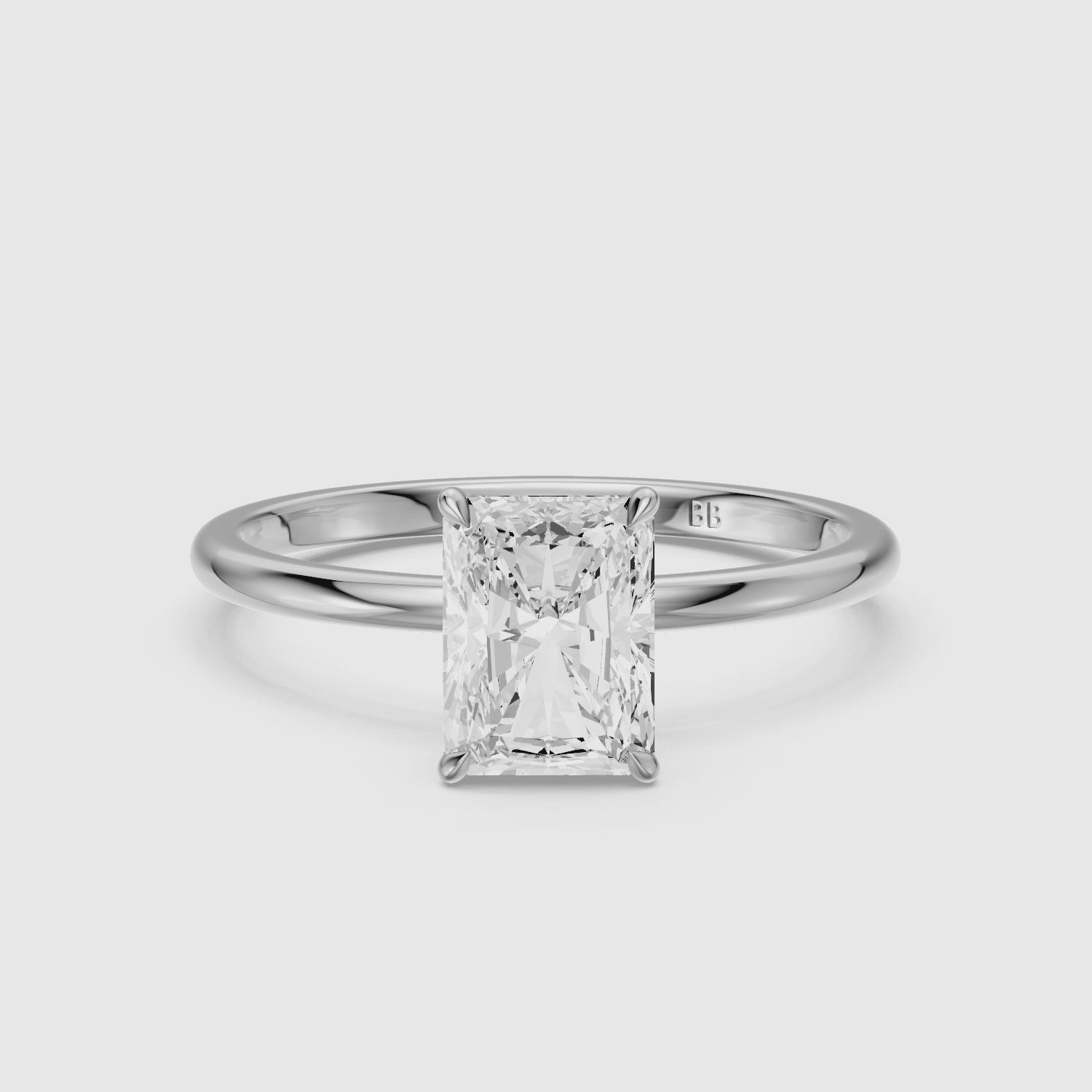 Load video: Clarie 4 Prong Radiant Cut Solitaire Moissanite Diamond Ring