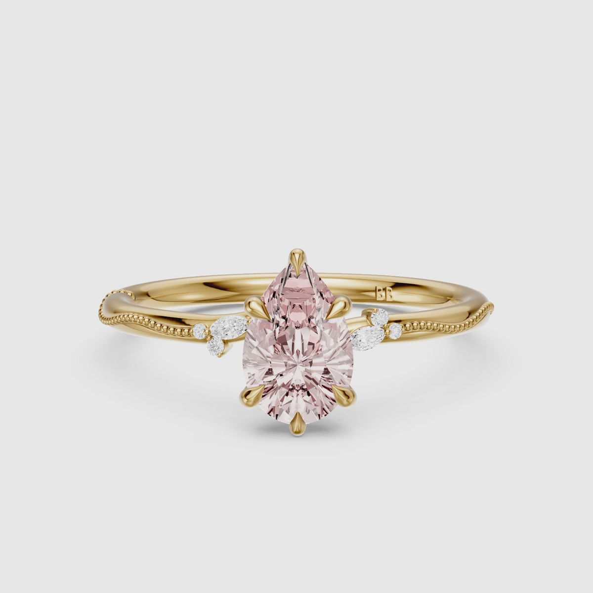 Load video: Bria Pear Cut Pink Lab Grown Diamond Side Stone Ring with Milgrain Band