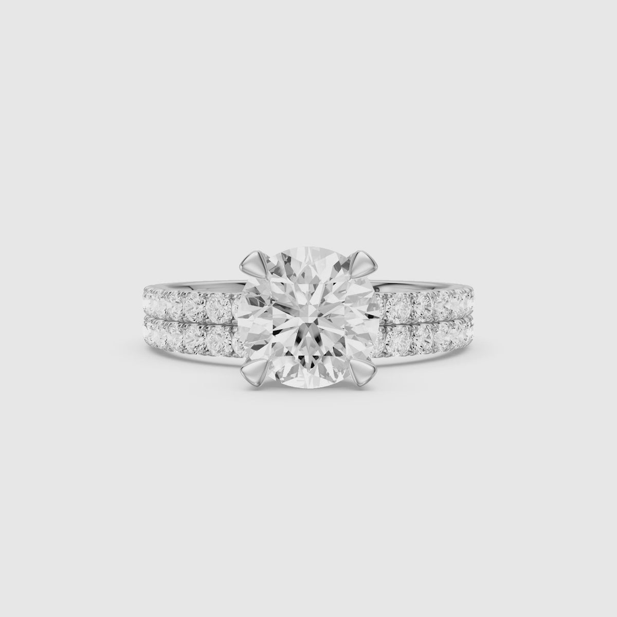 Load video: Lorena Round Cut Lab Grown Diamond Pave Bridal Set with Hidden Halo