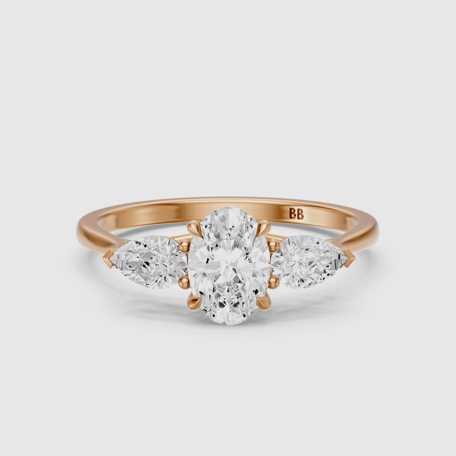 Load video: Ashlyn Three Stone Oval With Pear Side Stone Lab Grown Diamond Ring