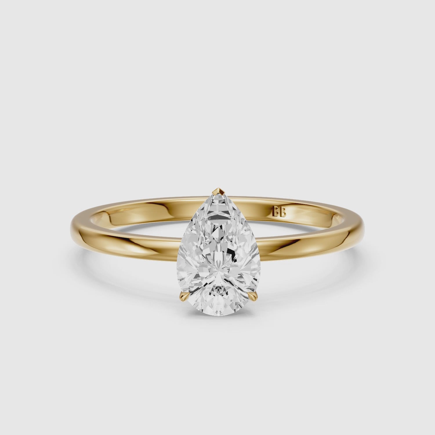 Load video: Demi Pear Cut Low Profile Solitaire Lab Grown Diamond Ring