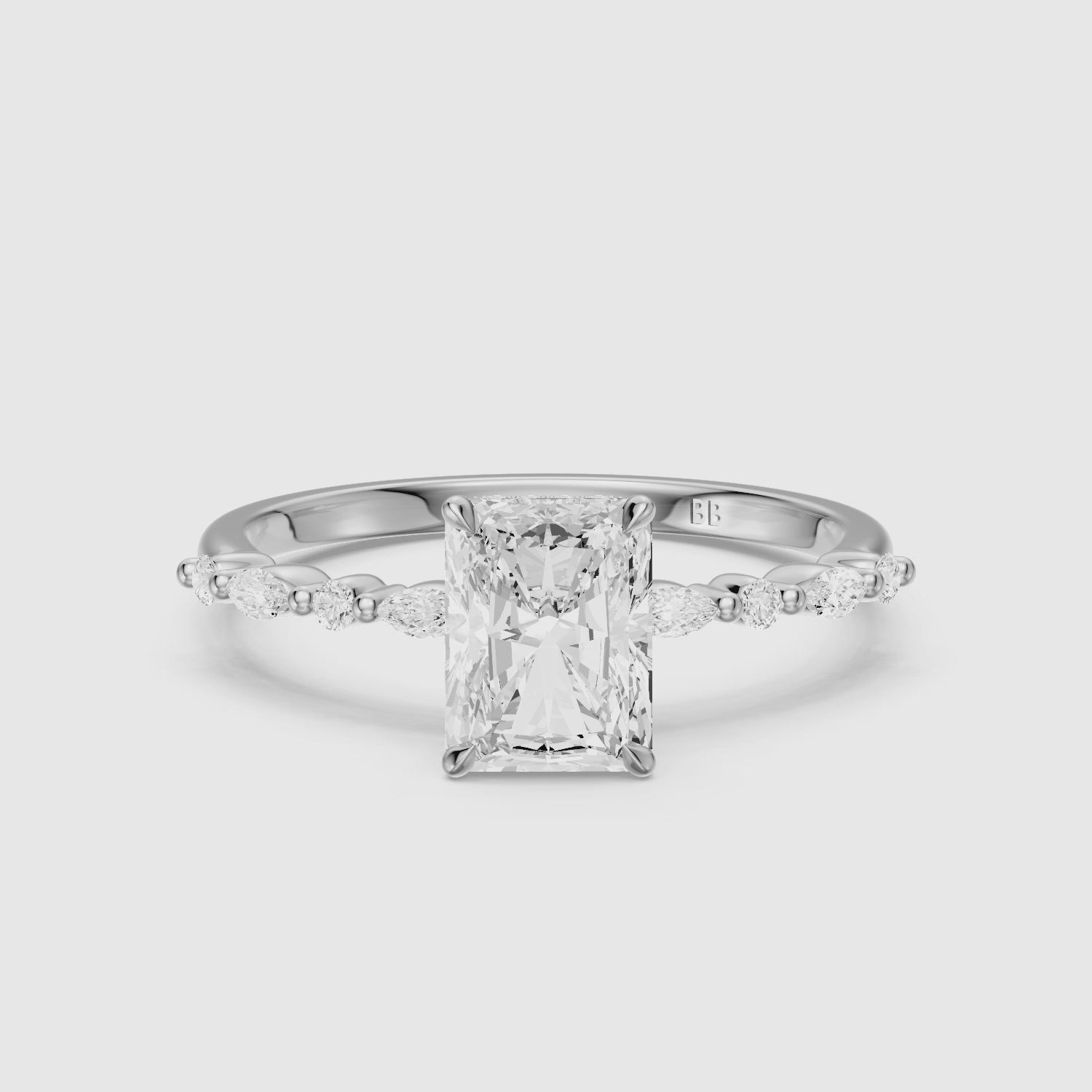 Load video: Emelyn Radiant Cut Hidden Halo Side Stone Moissanite Diamond Ring