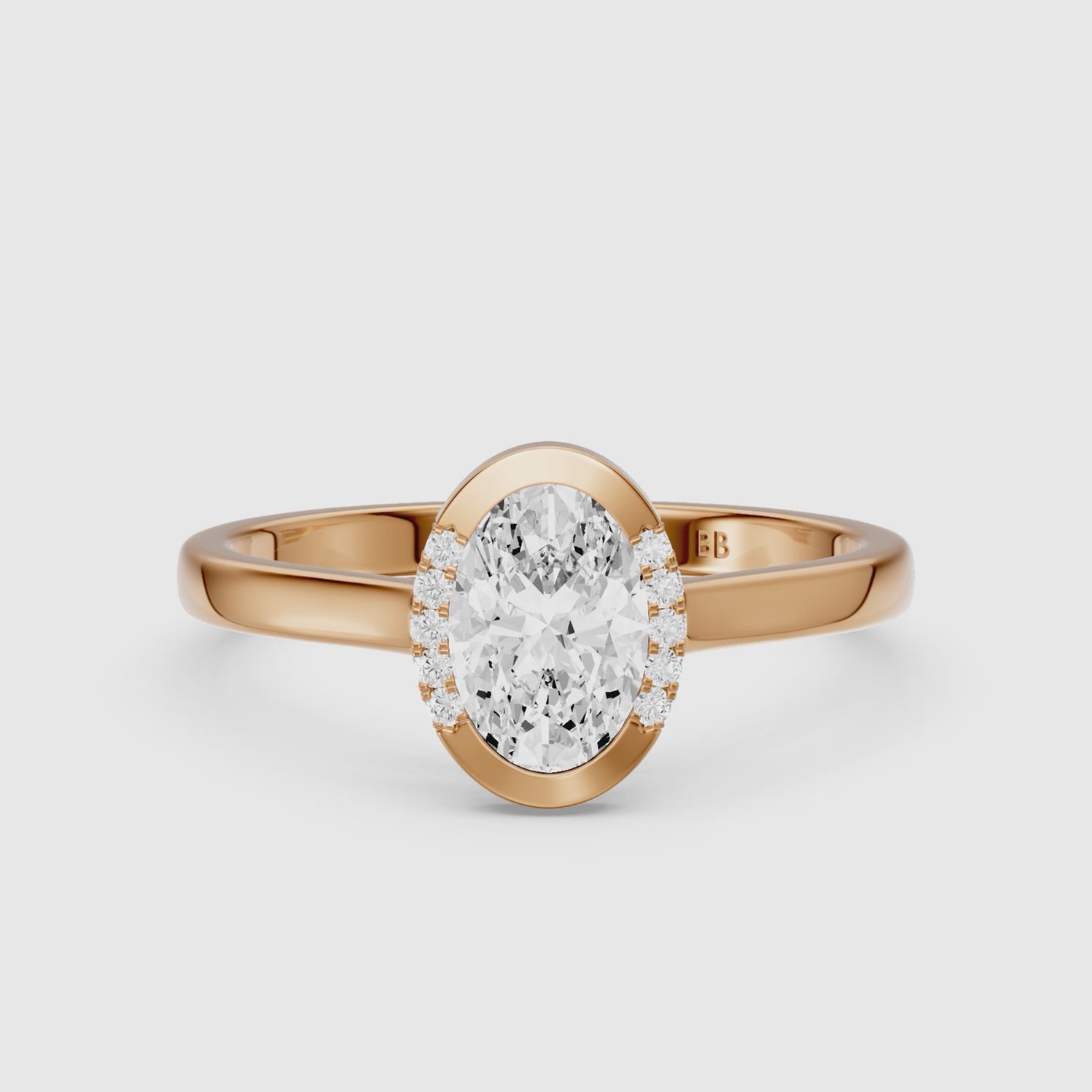 Load video: Lucy Oval Lab Grown Diamond Semi Bezel Hidden Halo Ring