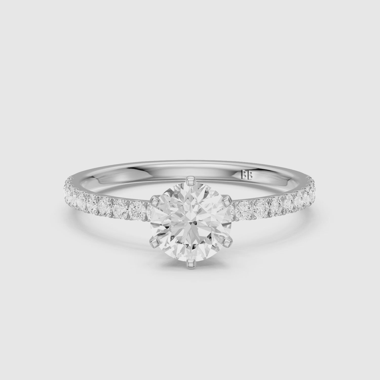 Load video: Maggie 6 Prong Round Cut Side Stone Pave Lab Grown Diamond Ring