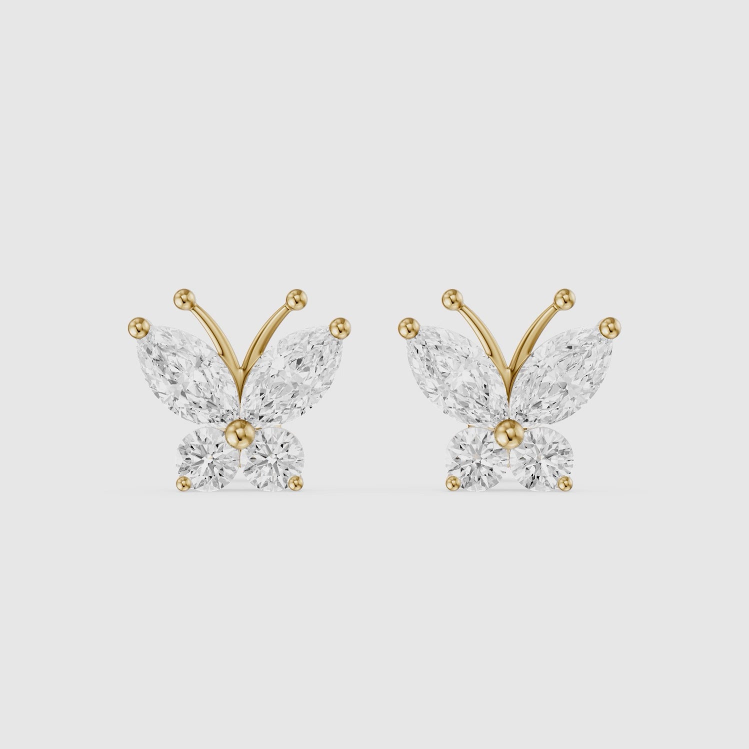 Load video: Delphine Marquise and Round Lab Grown Diamond Butterfly Stud Earrings