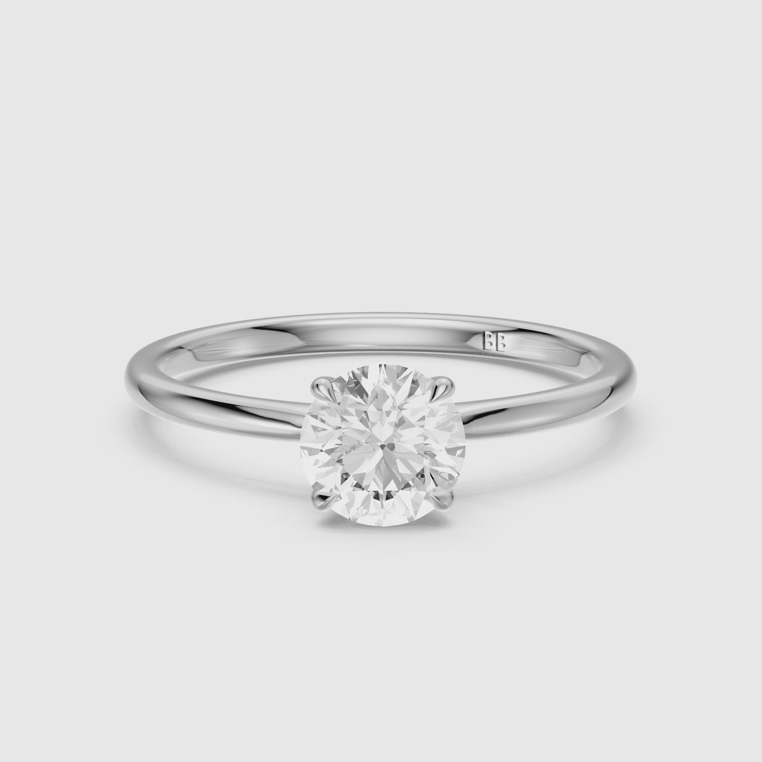 Load video: Carmen 4 Prong Round Cut Solitaire Moissanite Diamond Ring