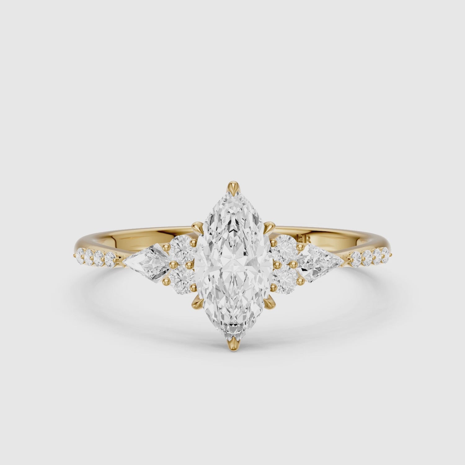 Load video: Charlie Marquise Cut Lab Grown Diamond Ring with Round and Kite Side Stones